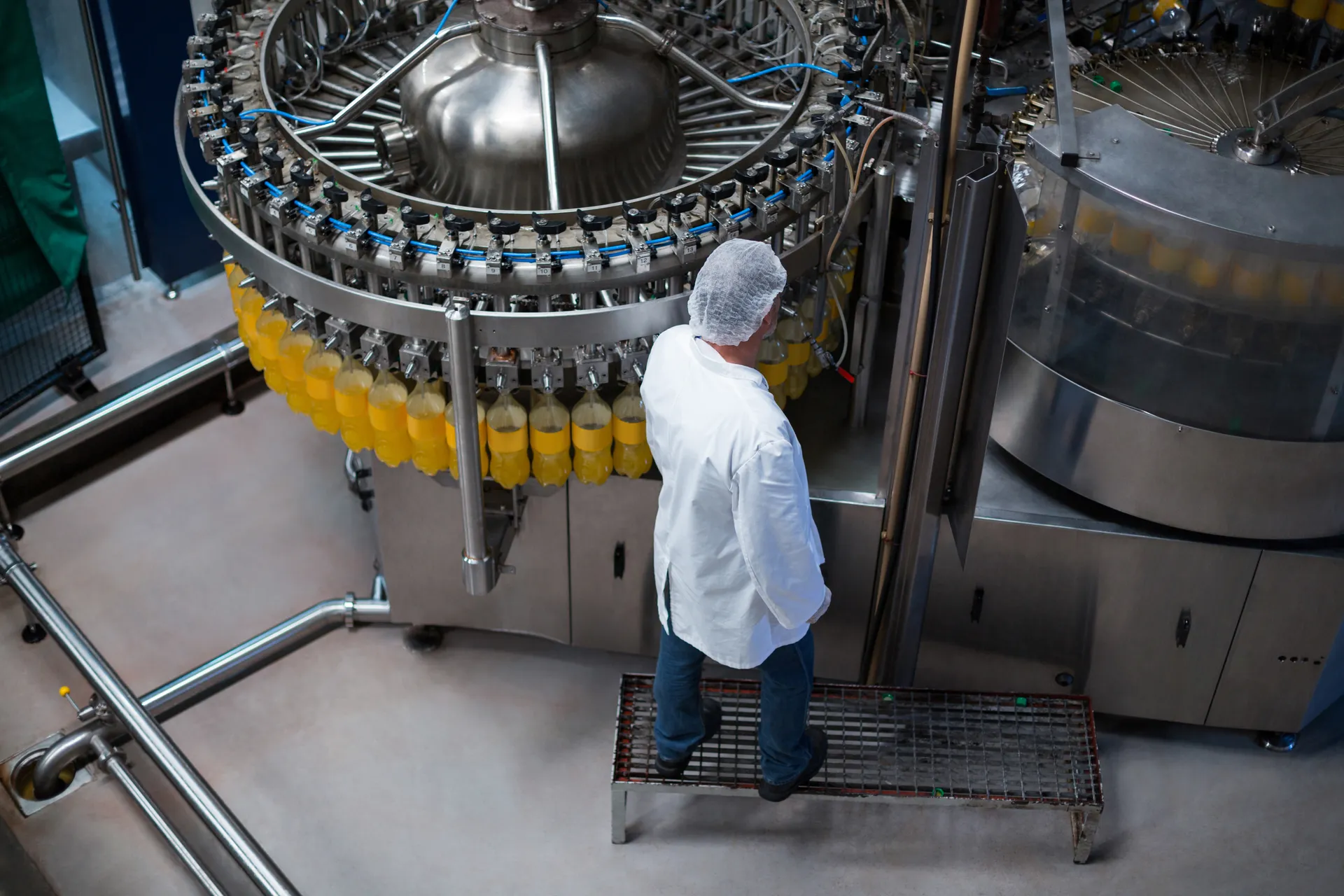 Engineer monitoring beverage production